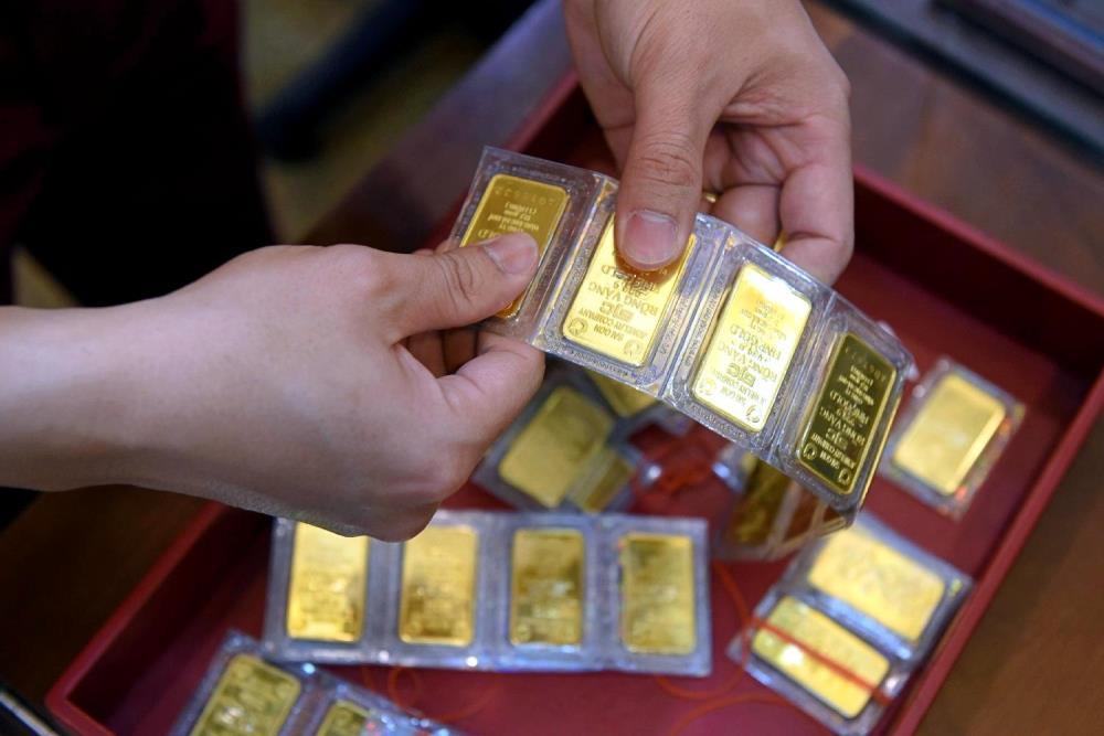 Nhiều ý kiến nhận định, nếu Ngân hàng Nhà nước vẫn tiếp tục quá trình đấu thầu vàng ‘ế’ thì giá vàng SJC có thể sớm cán mốc 90 triệu đồng/lượng.&nbsp;(Ảnh minh họa)