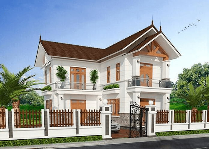Ảnh 3. Mẫu nhà chữ l 2 tầng 600 triệu mái ngói đỏ xung quanh trồng cây xanh tươi mát