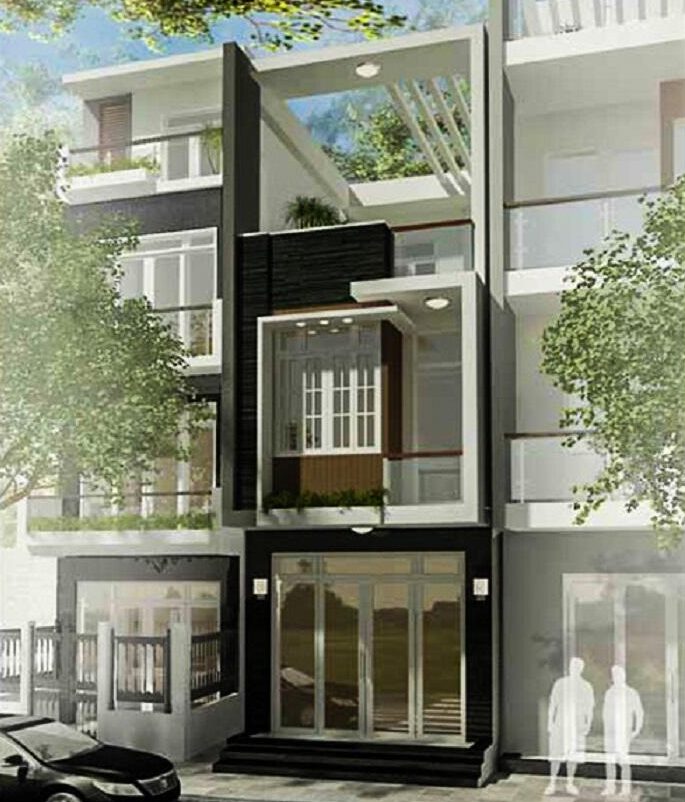 Mặt tiền được ốp đá tự nhiên màu tối làm tăng thêm sự sang trọng và giúp cho ngôi nhà trông hiện đại và năng động hơn