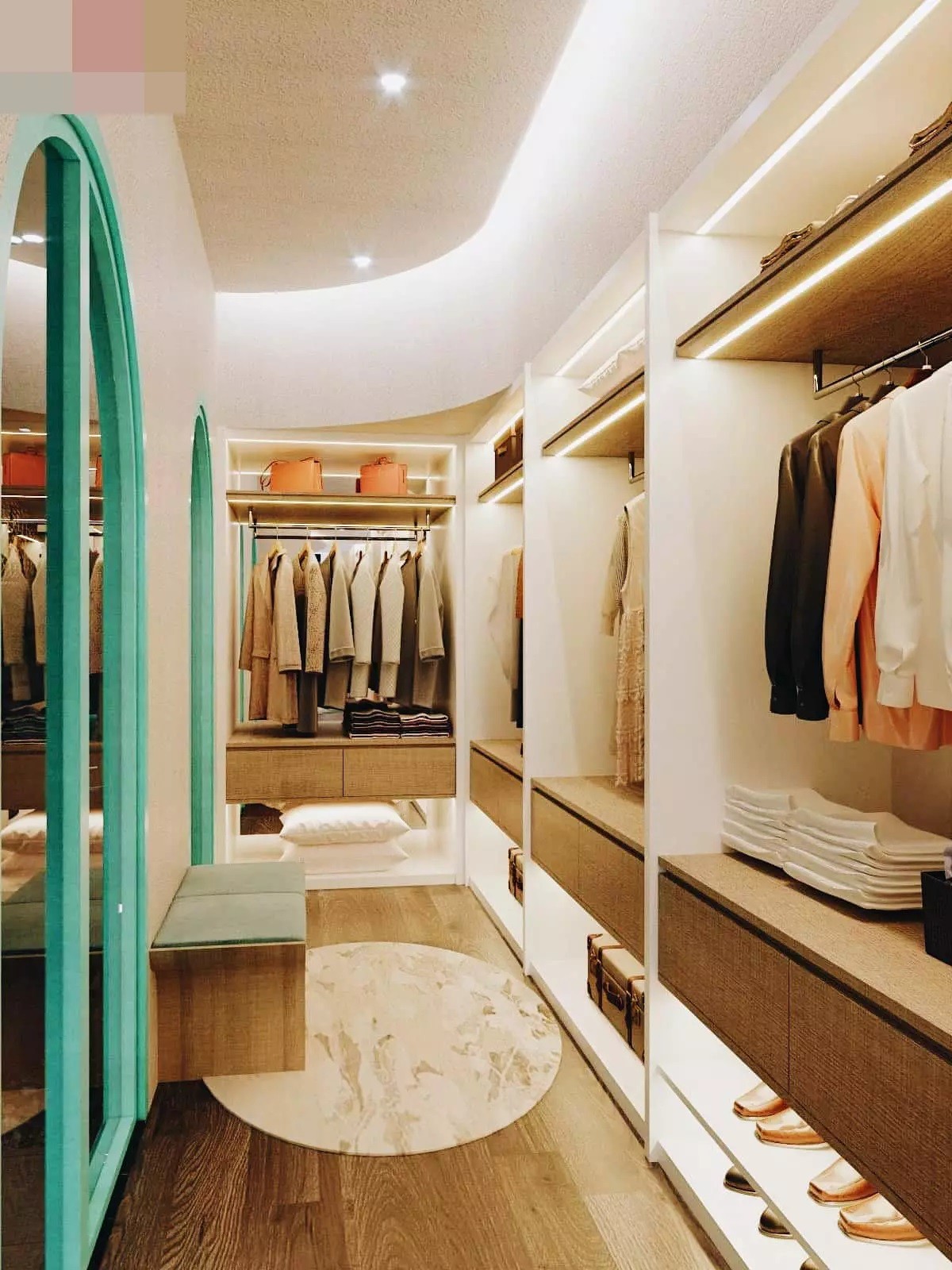 
Phòng thay đồ có hệ tủ mở kéo dài, trưng bày nhiều trang phục và đồ hiệu đắt đỏ, thể hiện đẳng cấp của chủ nhân&nbsp;
