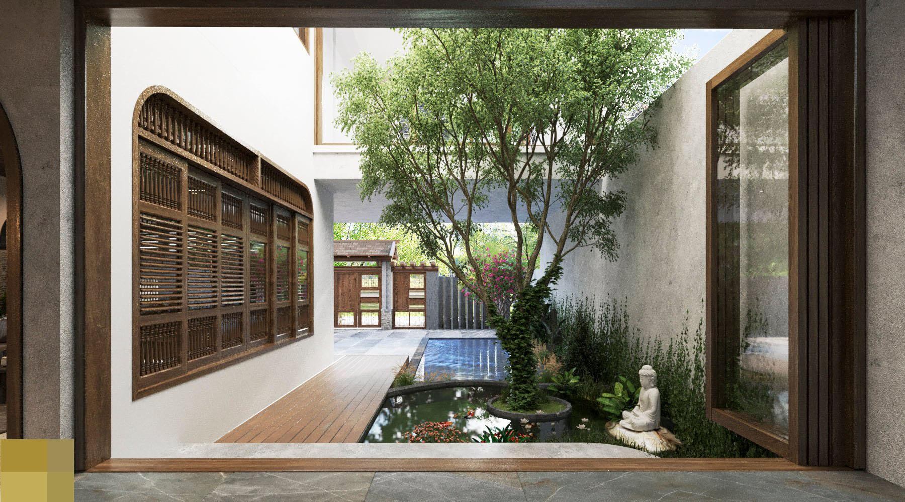 
Bể cá nằm cạnh phòng khách, bên cạnh là tượng Phật ngồi thiền mang cảm giác yên bình
