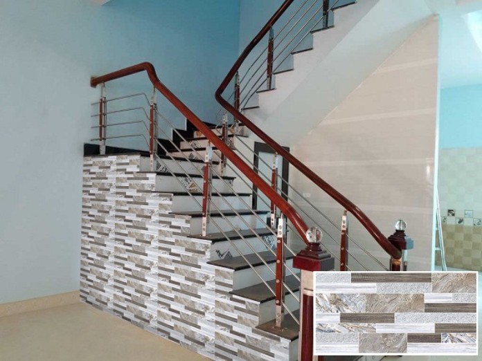 
Sử dụng gạch ốp tường vách cầu thang hạn chế bước hụt hoặc trượt chân
