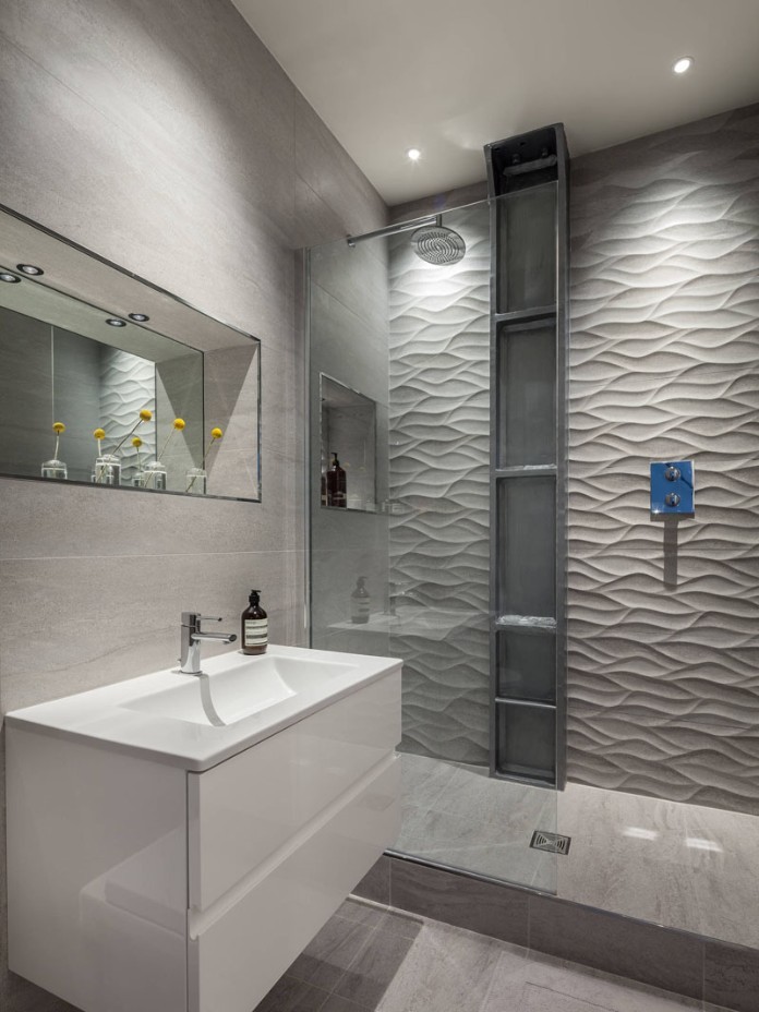 
Gạch ốp tường lượn sóng mang lại không gian phong cách hiện đại, điểm nhấn mới mẻ cho phòng tắm
