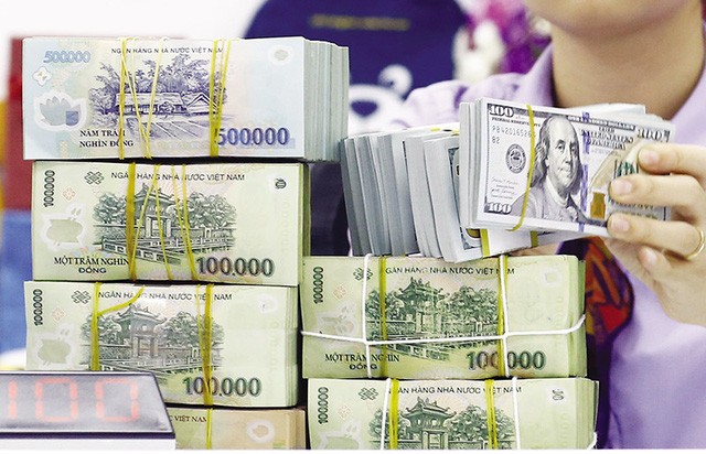 
Việc Fed tăng lãi suất gây áp lực lên tỷ giá USD/VND.
